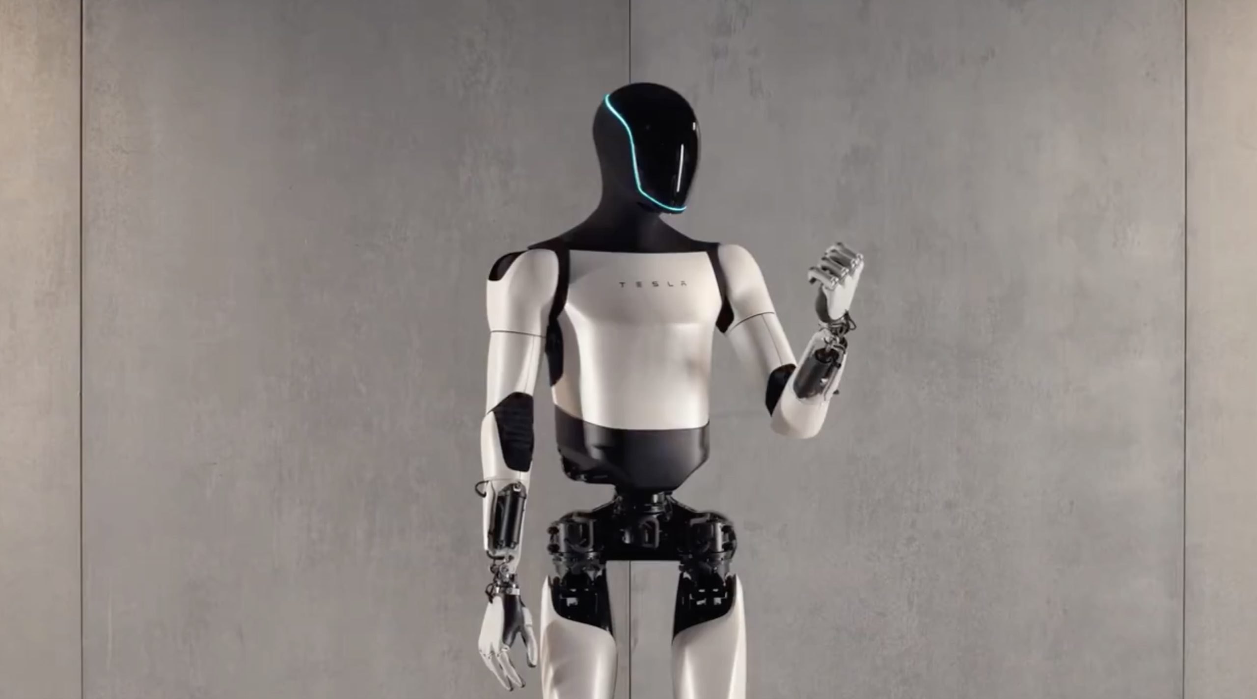 特斯拉机器人Optimus最新升级！可轻松捏起鸡蛋 还可以手舞足蹈