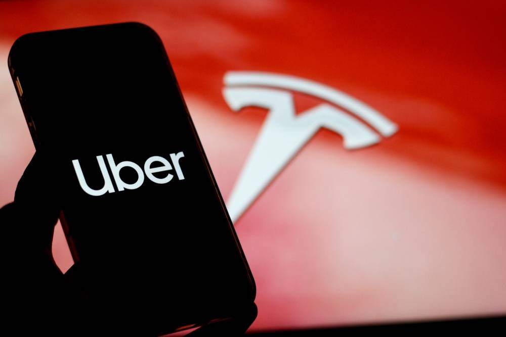 Uber CEO Questions on Tesla's Robotaxi Plan